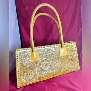 Hand  tooled yellow leather handbag